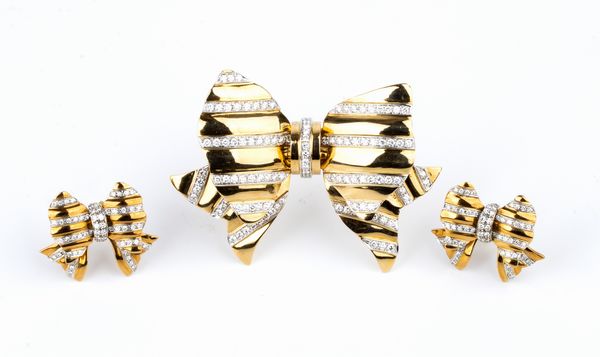 REPOSSI: spilla ed orecchini a fiocco in oro con diamanti  - Asta Gioielli, orologi, argenti e penne - Associazione Nazionale - Case d'Asta italiane