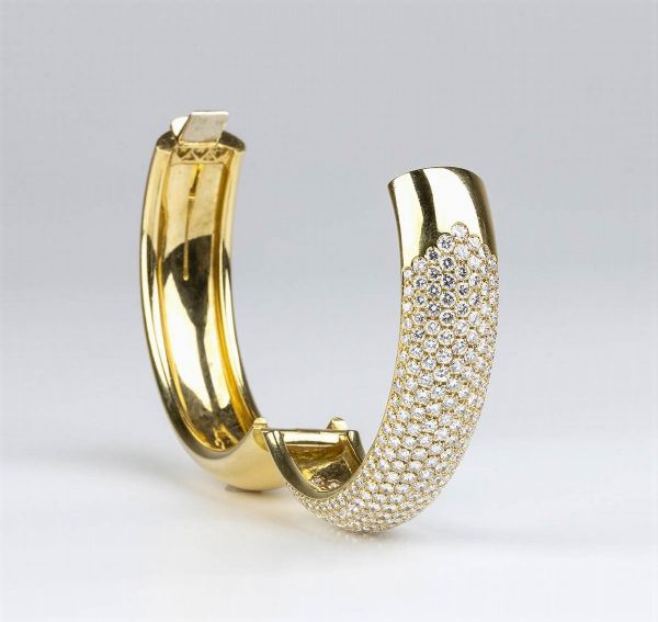 DAMIANI: bracciale a cerchio rigido in oro e diamanti  - Asta Gioielli, orologi, argenti e penne - Associazione Nazionale - Case d'Asta italiane