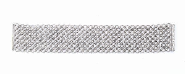 CELIN: bracciale a fascia morbida in oro  - Asta Gioielli, orologi, argenti e penne - Associazione Nazionale - Case d'Asta italiane