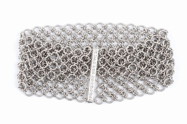 CELIN: bracciale a fascia morbida in oro  - Asta Gioielli, orologi, argenti e penne - Associazione Nazionale - Case d'Asta italiane