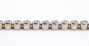 Bracciale tennis in oro e diamanti  - Asta Gioielli, orologi, argenti e penne - Associazione Nazionale - Case d'Asta italiane