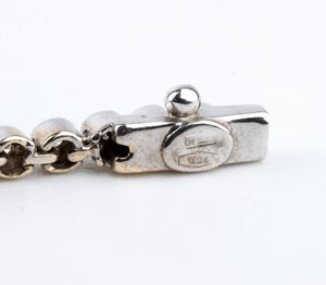 Bracciale tennis in oro e diamanti  - Asta Gioielli, orologi, argenti e penne - Associazione Nazionale - Case d'Asta italiane