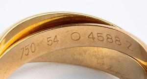 LE MUST DE CARTIER: anello Trinity in oro  - Asta Gioielli, orologi, argenti e penne - Associazione Nazionale - Case d'Asta italiane