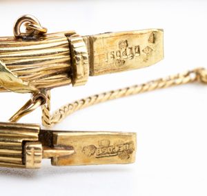 Coppia di bracciali in oro giallo - Francia inizio XX secolo  - Asta Gioielli, orologi, argenti e penne - Associazione Nazionale - Case d'Asta italiane