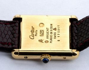 LE MUST DE CARTIER Tank: orologio da polso in argento vermeille, anni '70-'80  - Asta Gioielli, orologi, argenti e penne - Associazione Nazionale - Case d'Asta italiane