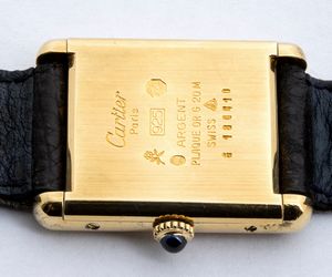 LE MUST DE CARTIER Tank: orologio da polso in argento vermeille, anni '70-'80  - Asta Gioielli, orologi, argenti e penne - Associazione Nazionale - Case d'Asta italiane