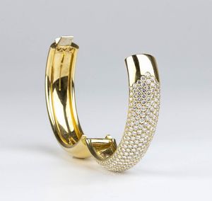 DAMIANI: bracciale a cerchio rigido in oro e diamanti  - Asta Gioielli, orologi, argenti e penne - Associazione Nazionale - Case d'Asta italiane