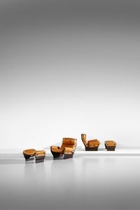 BORSANI OSVALDO (1911 - 1985) - Coppia di poltrone con poggiapiedi mod. Canada per Tecno