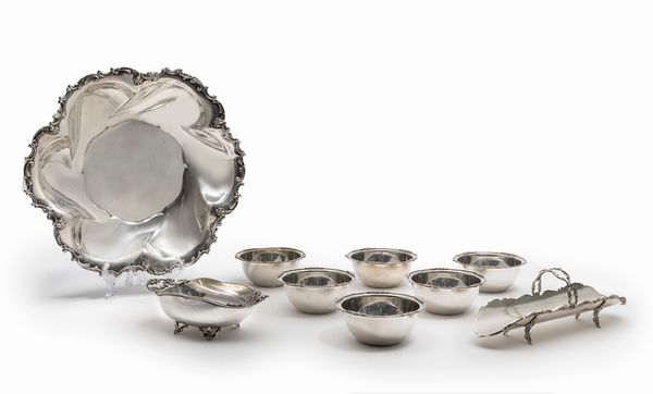 Nove oggetti da tavola  - Asta Argenti - Associazione Nazionale - Case d'Asta italiane