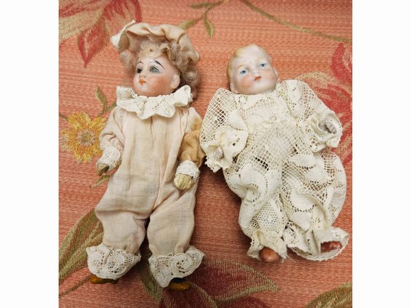 Quattro bamboline beb�  - Asta Bambole e Balocchi - Associazione Nazionale - Case d'Asta italiane