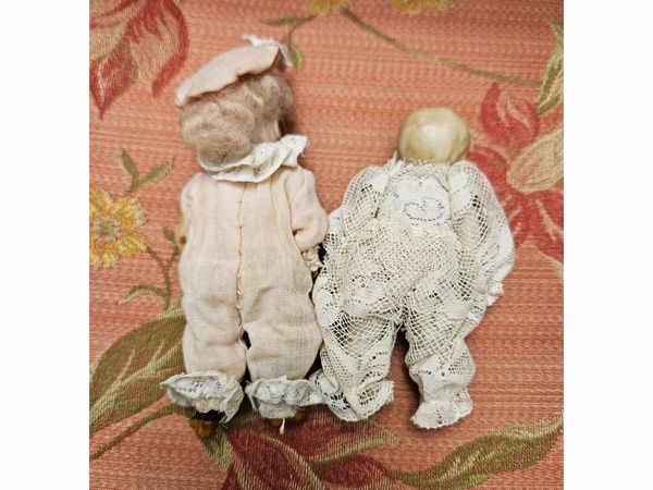 Quattro bamboline beb�  - Asta Bambole e Balocchi - Associazione Nazionale - Case d'Asta italiane