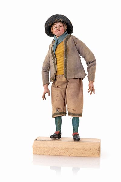 Giovane contadino con cappello e sciarpa azzurra  - Asta Dalla Collezione Antonio Latini e altre provenienze Antichi Pastori da Presepe, Accessori e libri sul tema - Associazione Nazionale - Case d'Asta italiane