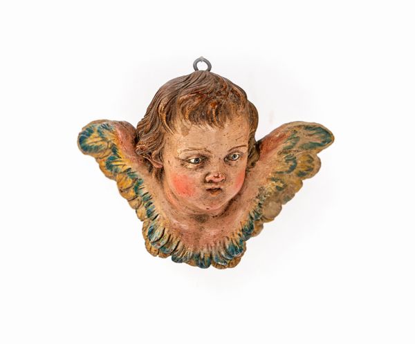 Matteo Bottiglieri, Attribuito a : Testa di cherubino in terracotta policroma  - Asta Dalla Collezione Antonio Latini e altre provenienze Antichi Pastori da Presepe, Accessori e libri sul tema - Associazione Nazionale - Case d'Asta italiane
