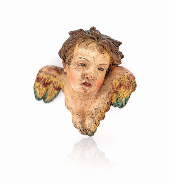 Giuseppe Sammartino, Attribuito a : Testa di cherubino in terracotta policroma  - Asta Dalla Collezione Antonio Latini e altre provenienze Antichi Pastori da Presepe, Accessori e libri sul tema - Associazione Nazionale - Case d'Asta italiane