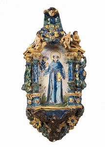 Italia meridionale, fine XVIII secolo - Acquasantiera in maiolica policroma raffigurante Sant'Antonio