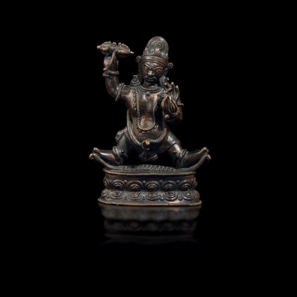 Figura di Vajrapani su fiore di loto in bronzo, Tibet, XV secolo  - Asta Fine Chinese Works of Art - Associazione Nazionale - Case d'Asta italiane