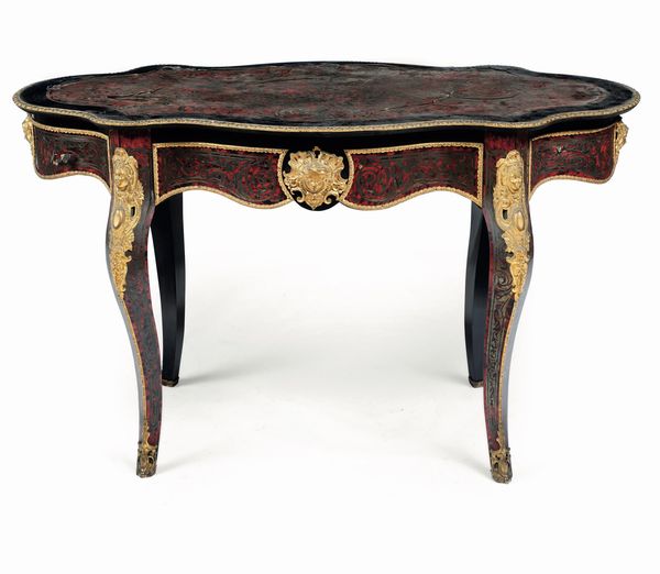 Tavolo ovale in legno ebanizzato e decoro in bronzo e metallo dorato stile Boulle, Francia XIX secolo  - Asta Dimore Italiane - Associazione Nazionale - Case d'Asta italiane