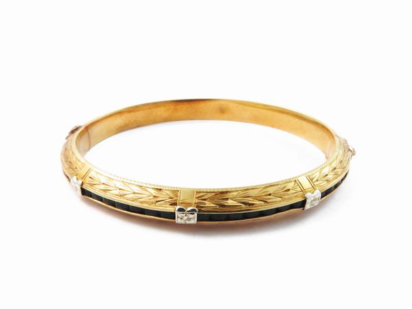 Bracciale rigido in oro bianco e giallo con gemme blu  - Asta Gioielli e Orologi - Associazione Nazionale - Case d'Asta italiane