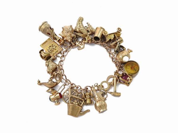 Bracciale Charms in oro prevalentemente 375/1000  - Asta Gioielli e Orologi - Associazione Nazionale - Case d'Asta italiane