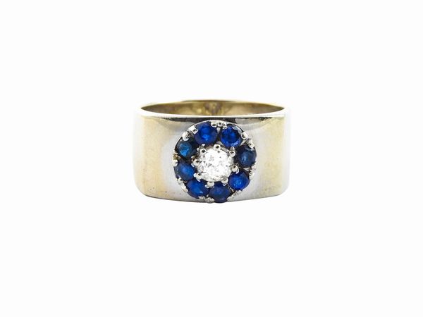 Anello a fascia in oro bianco con diamante e zaffiri  - Asta Gioielli e Orologi - Associazione Nazionale - Case d'Asta italiane