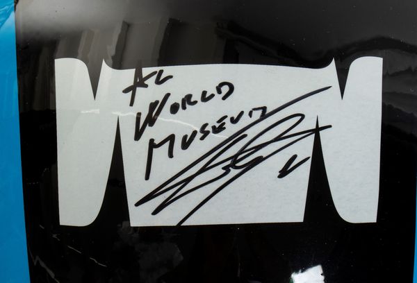 Motociclismo, Loris Capirossi , tuta da gara e casco autografati  - Asta Antique Toys & Sports Memorabilia - Associazione Nazionale - Case d'Asta italiane