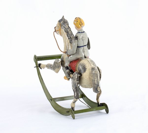 Gunthermann, Bambino su cavallo a dondolo  - Asta Antique Toys & Sports Memorabilia - Associazione Nazionale - Case d'Asta italiane