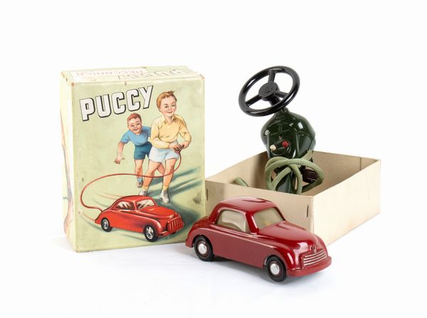 DOMO Puccy car prima seria  - Asta Antique Toys & Sports Memorabilia - Associazione Nazionale - Case d'Asta italiane