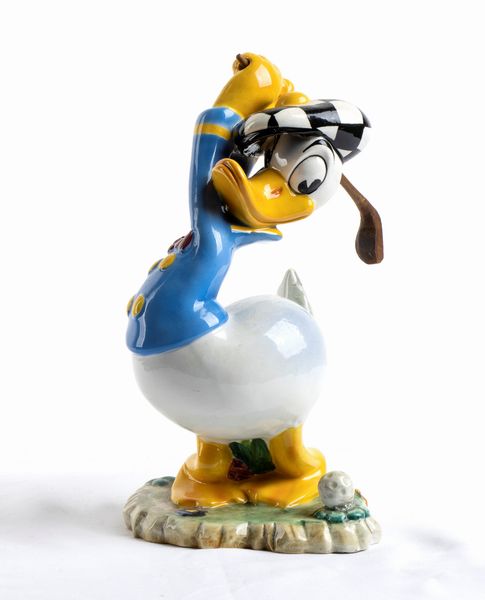DISNEY ceramica Zaccagnini , PAPERINO golfista  - Asta Antique Toys & Sports Memorabilia - Associazione Nazionale - Case d'Asta italiane