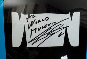 Motociclismo, Loris Capirossi , tuta da gara e casco autografati  - Asta Antique Toys & Sports Memorabilia - Associazione Nazionale - Case d'Asta italiane