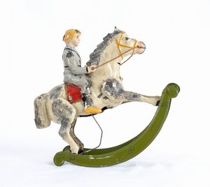 Gunthermann, Bambino su cavallo a dondolo  - Asta Antique Toys & Sports Memorabilia - Associazione Nazionale - Case d'Asta italiane