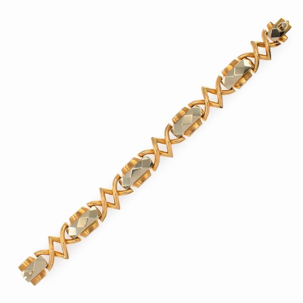 Bracciale a motivo geometrico in oro a due colori 18kt  - Asta Gioielli Orologi | Fashion Vintage - Associazione Nazionale - Case d'Asta italiane