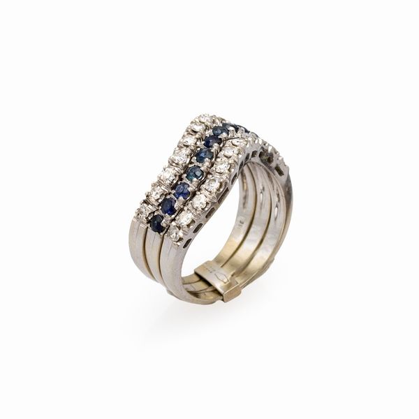 Anello tre riviere in oro bianco 18kt diamanti e zaffiri  - Asta Gioielli Orologi | Fashion Vintage - Associazione Nazionale - Case d'Asta italiane