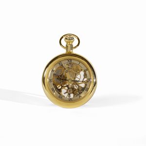. - Un orologio da taschino metallo dorato con ingranaggi a vista.