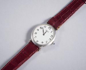 Piaget : Orologio in oro bianco 18k  di forma ovale con movimento meccanico, cifre arabe,  con cinturino in coccodrillo bordeaux e fibbia originale.  - Asta GIOIELLI - OROLOGI - ALL I WANT FOR CHRISTMAS Online - Associazione Nazionale - Case d'Asta italiane