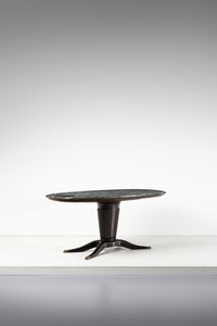 BUFFA PAOLO (1903 - 1970) - nello stile di. Tavolo con piano ovale, gamba centrale e piedini a zampa di felino
