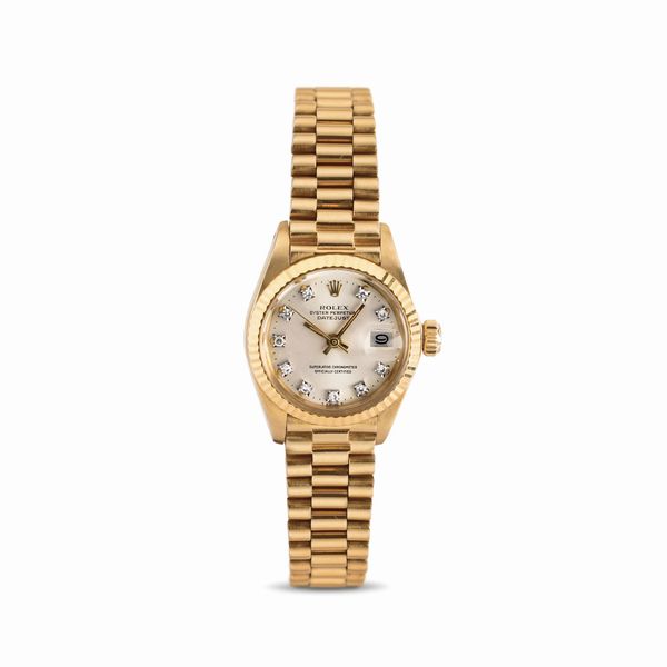 ROLEX : Affascinante e raffinato Datejust Lady ref 6917, in oro giallo 18k, bracciale President, quadrante Argent� con indici in brillanti  - Asta Orologi da Polso - Associazione Nazionale - Case d'Asta italiane