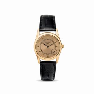 PATEK PHILIPPE - Elegante Calatrava ref 5000 R in oro rosa 18k, quadrante Salmone con numeri Arabi applicati e piccoli secondi ad ore 4, movimento automatico con microrotore e fondo a vista