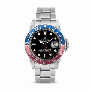 ROLEX - GMT Master Pepsi ref 1675 Long E in acciaio con ghiera girevole bicolore, quadrante nero opaco pallettoni, bracciale Oyster ripiegato, corredato da scatola garanzia e fattura d'acquisto originale