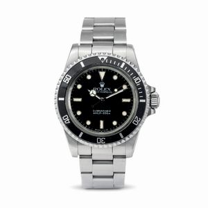 ROLEX - Iconico Submariner ref 5513 in acciaio inossidabile transizionale con vetro plastica e quadrante nero lucido Bicchierini, movimento automatico e bracciale Oyster