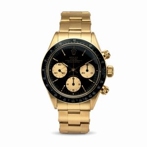 ROLEX - Eccezionale Cosmograph Daytona ref 6263 in oro giallo 18k, quadrante nero contatori champagne, ghiera nera acrilica, bracciale rivettato accompagnato da garanzia originale
