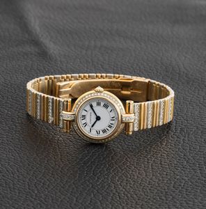 CARTIER : Raffinato orologio da polso in oro giallo e bianco 18k con diamanti su cassa e bracciale con movimento al quarzo  - Asta Orologi da Polso - Associazione Nazionale - Case d'Asta italiane