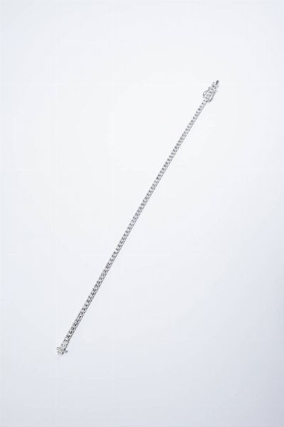 BRACCIALE : Peso gr 6 3 Lunghezza cm 17 5 in oro bianco  modello tennis  con diamanti taglio brillante per totali ct 1 0 ca.  - Asta Gioielli - Associazione Nazionale - Case d'Asta italiane