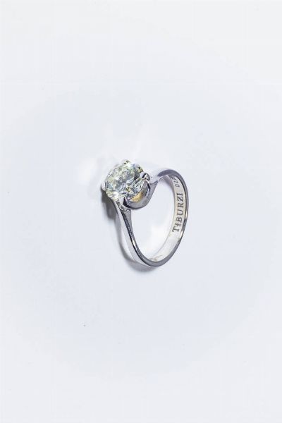 TIBURZI : Peso gr 4 2 Misura 13 (53) Anello in oro bianco con diamante solitario di ct 2 03 ca  colore M  SI2. Certificato di analisi IGI  Roma 28 Settembre 2023  - Asta Gioielli - Associazione Nazionale - Case d'Asta italiane