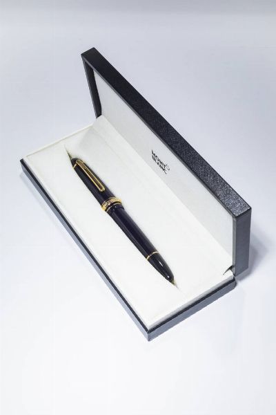 MONTBLANC : Stilografica Montblanc  modello Meisterstuck. Cappuccio e corpo in resina. Rifiniture in oro 14 Kt. Corredata di scatola e controscatola.  - Asta Gioielli - Associazione Nazionale - Case d'Asta italiane