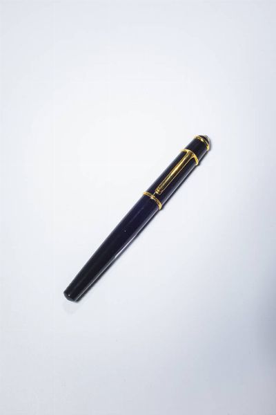 CARTIER : Stilografica Cartier  modello Diablo  Cappuccio con gemma cabochon e corpo in resina nera. Finiture color oro giallo. Pennino in oro giallo e bianco.  - Asta Gioielli - Associazione Nazionale - Case d'Asta italiane