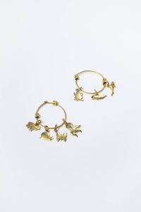 POMELLATO - Peso gr 11 8 Coppia di orecchini in oro giallo  firmati Pomellato  linea Dodo con charms pendenti: una rana  uno  [..]