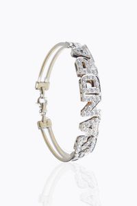 BRACCIALE - Peso gr 24 5 Diam. interno cm 6 Lunghezza cm 17 in oro bianco  semirigido  recante al centro la scritta Sandra  [..]
