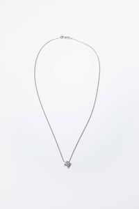 PUNTO LUCE - Peso gr 4 1 in oro bianco con diamante taglio brillante di ct 0 72 ca  colore G-H  purezza VS.