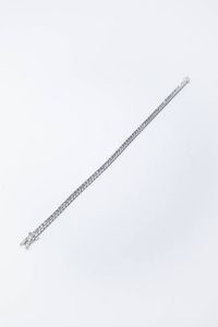 BRACCIALE - Peso gr 10 7 Lunghezza cm 18 in oro bianco  modello tennis  con diamanti taglio brillante per totali ct 2 28 ca  [..]
