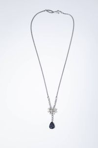 GIROCOLLO - Peso gr 13 9 in oro bianco  maglia coda di topo  al centro zaffiro taglio a goccia di ct 1 80 ca  sormontatato  [..]